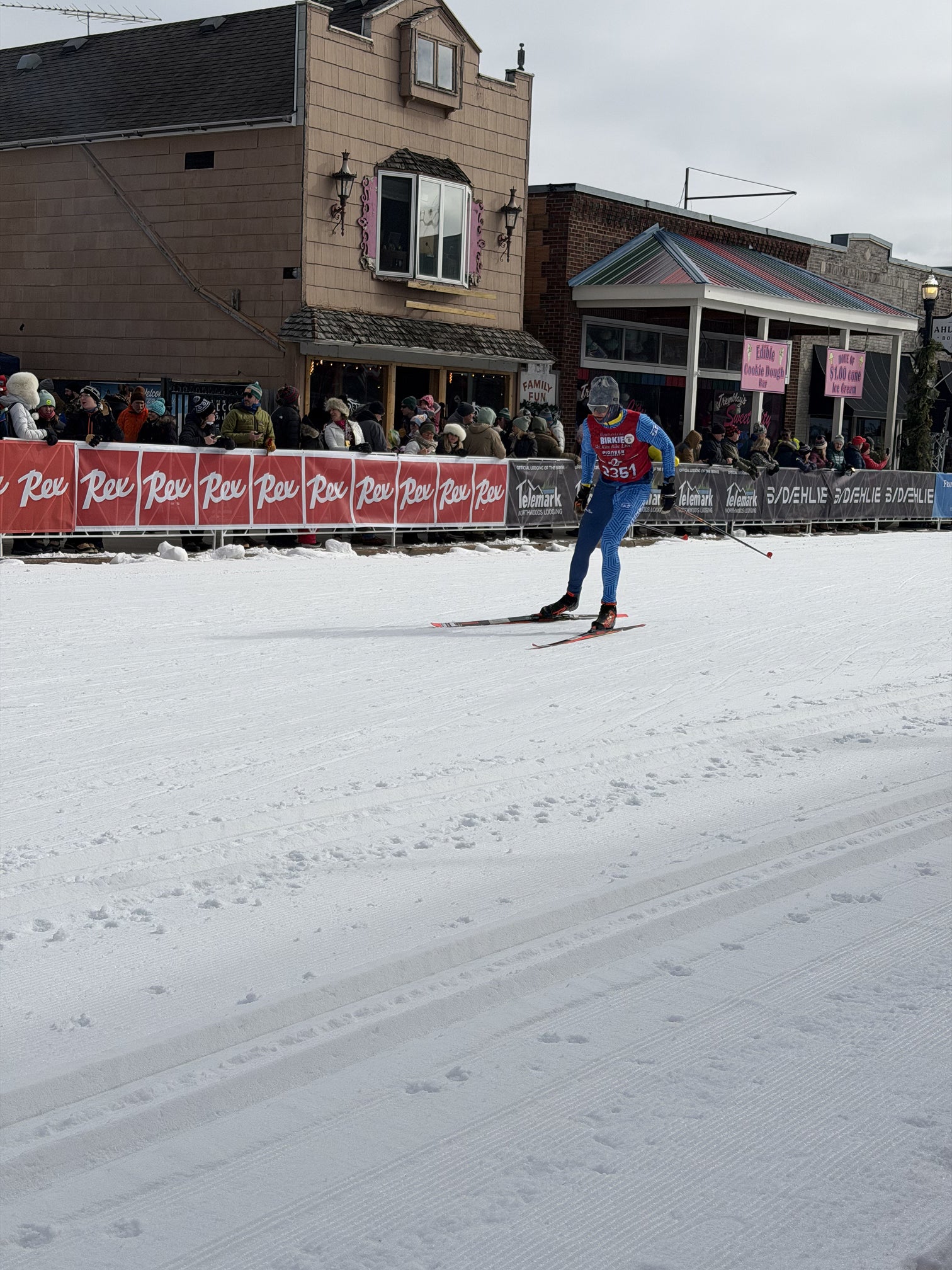 Skier pushing through the finish